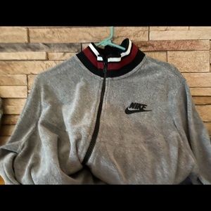 Nike women’s warm up top.